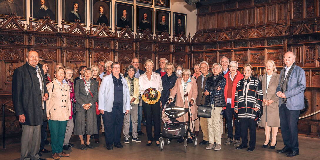 Gruppenfoto der Clubmitglieder im Friedenssaal des Historischen Rathauses Münster